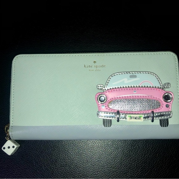 kate spade Handbags - Kate Spade “Checking In” Car Wallet